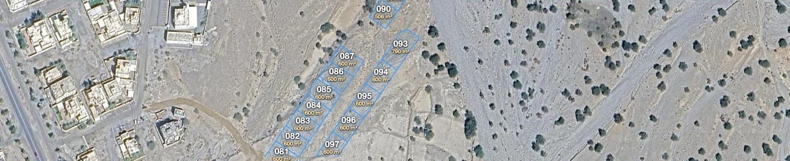 Verified land plots outlined on satellite imagery near Muscat